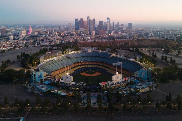 built into the slopes of a mountain, with sweeping views of los angeles from downtown to the hollywood sign and beyond, dodger stadium offers a definitive perspective on the city