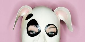Woman wearing a dog mask
