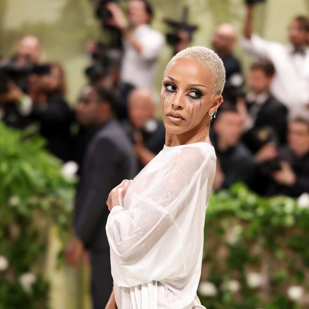 Doja Cat Wears Nothing but a Wet, White T-Shirt Gown to the 2024 Met Gala