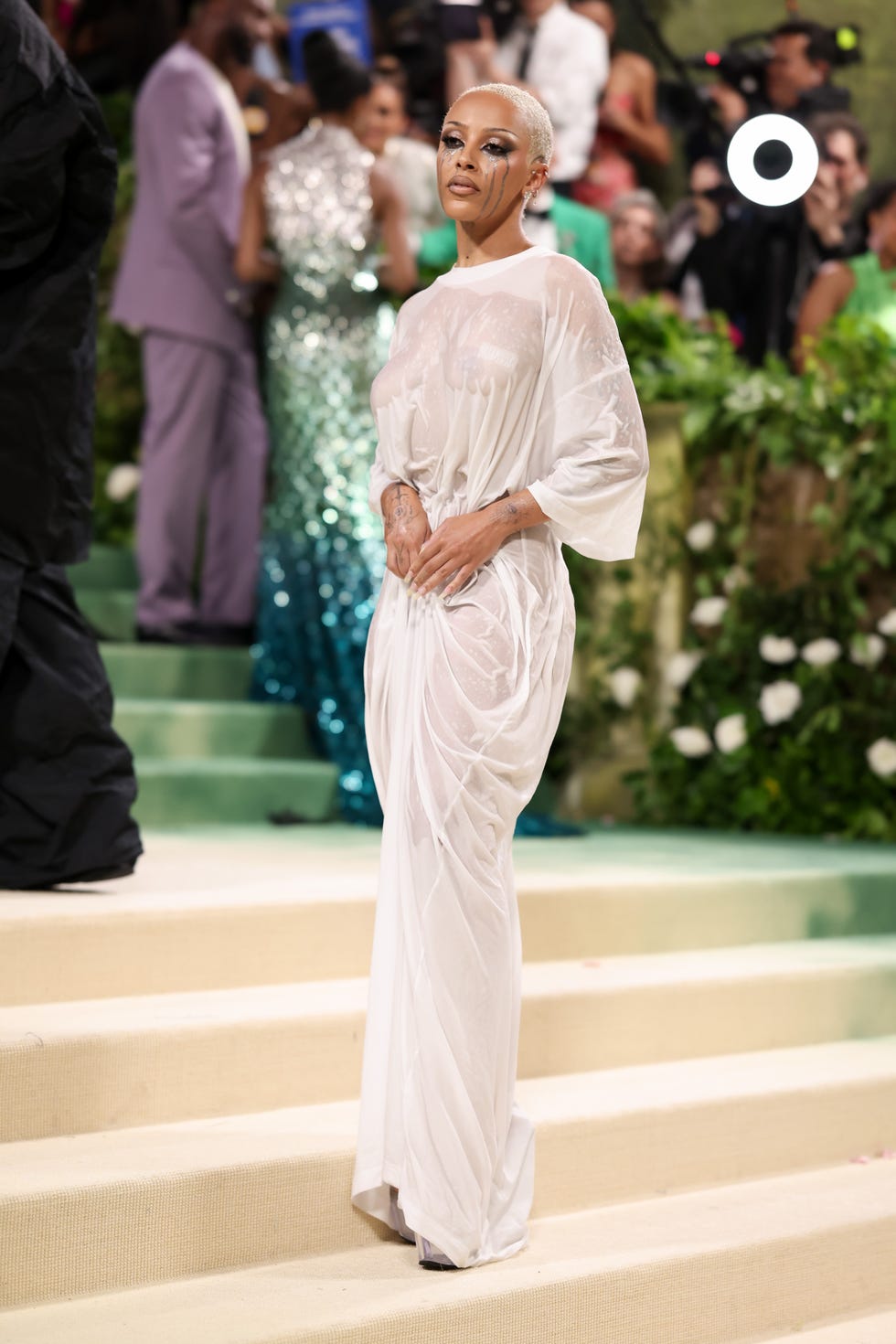 Doja Cat Wears Nothing but a Wet, White T-Shirt Gown to the 2024 Met Gala