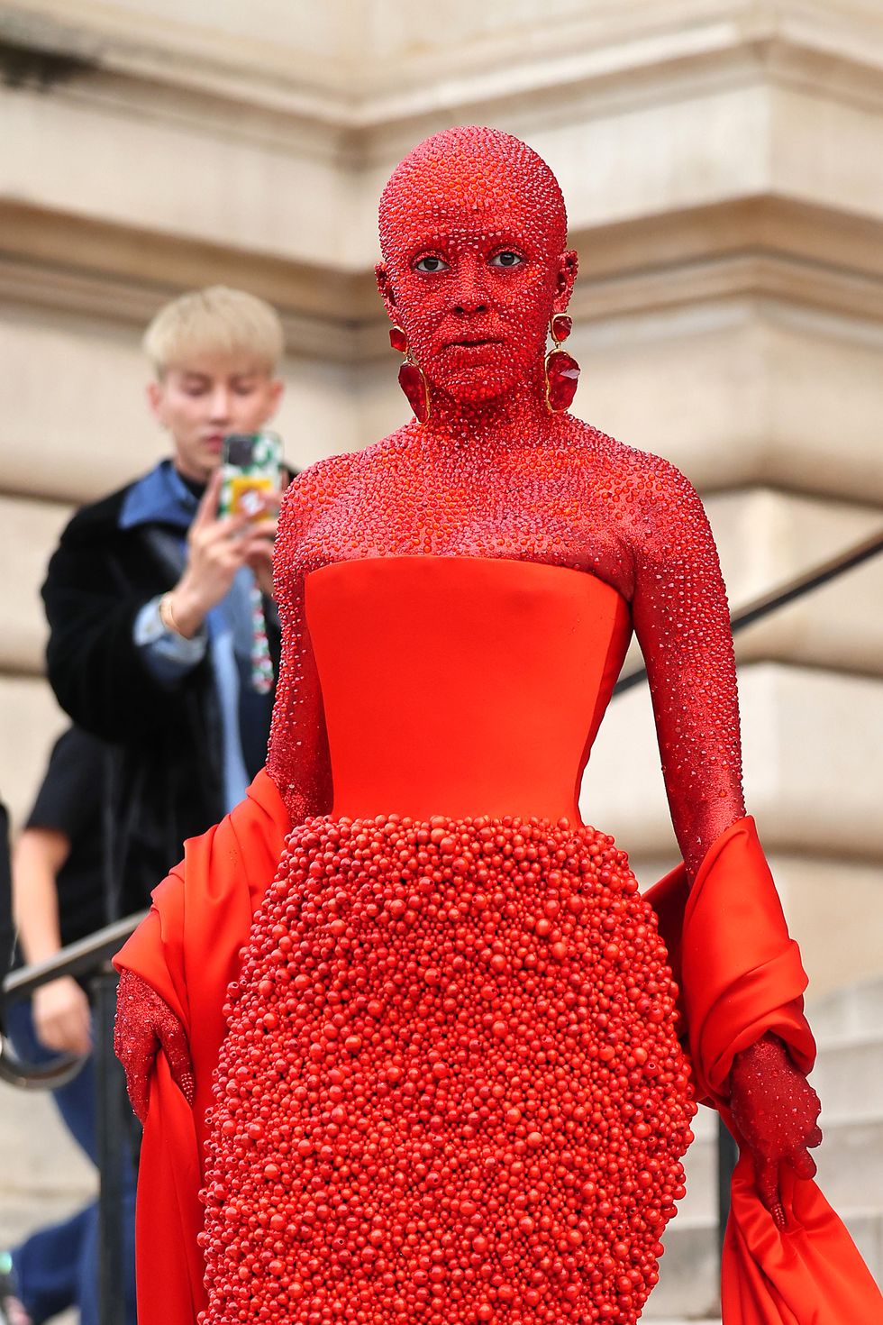 Doja Cat covered herself in red body paint and 30,000 crystals for