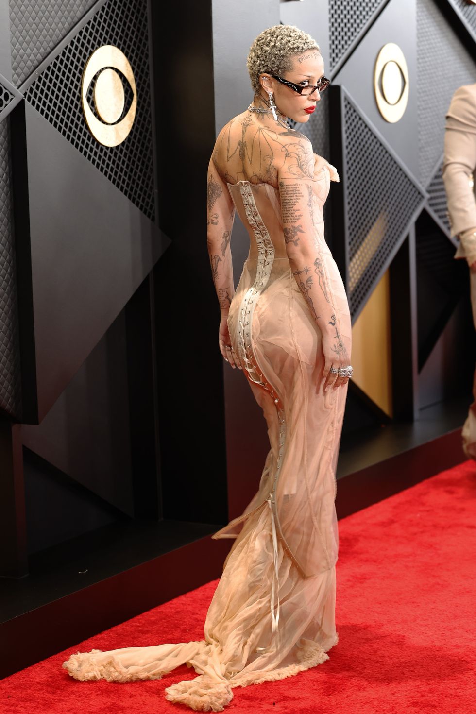 los angeles, california february 04 for editorial use only editors note image contains partial nudity doja cat attends the 66th grammy awards at cryptocom arena on february 04, 2024 in los angeles, california photo by frazer harrisongetty images