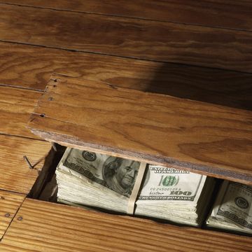 100 dollar bills under floor