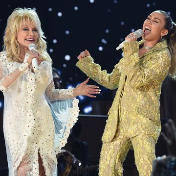 los angeles, ca   february 10  dolly parton l and miley cyrus perform onstage during the 61st annual grammy awards at staples center on february 10, 2019 in los angeles, california  photo by kevin mazurgetty images for the recording academy