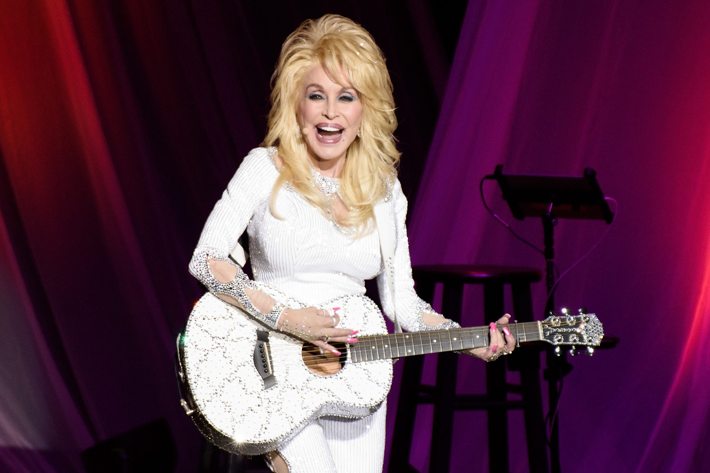 Dolly Parton Just Launched a Line of Dog Toys and Apparel Called 'Doggy Parton'