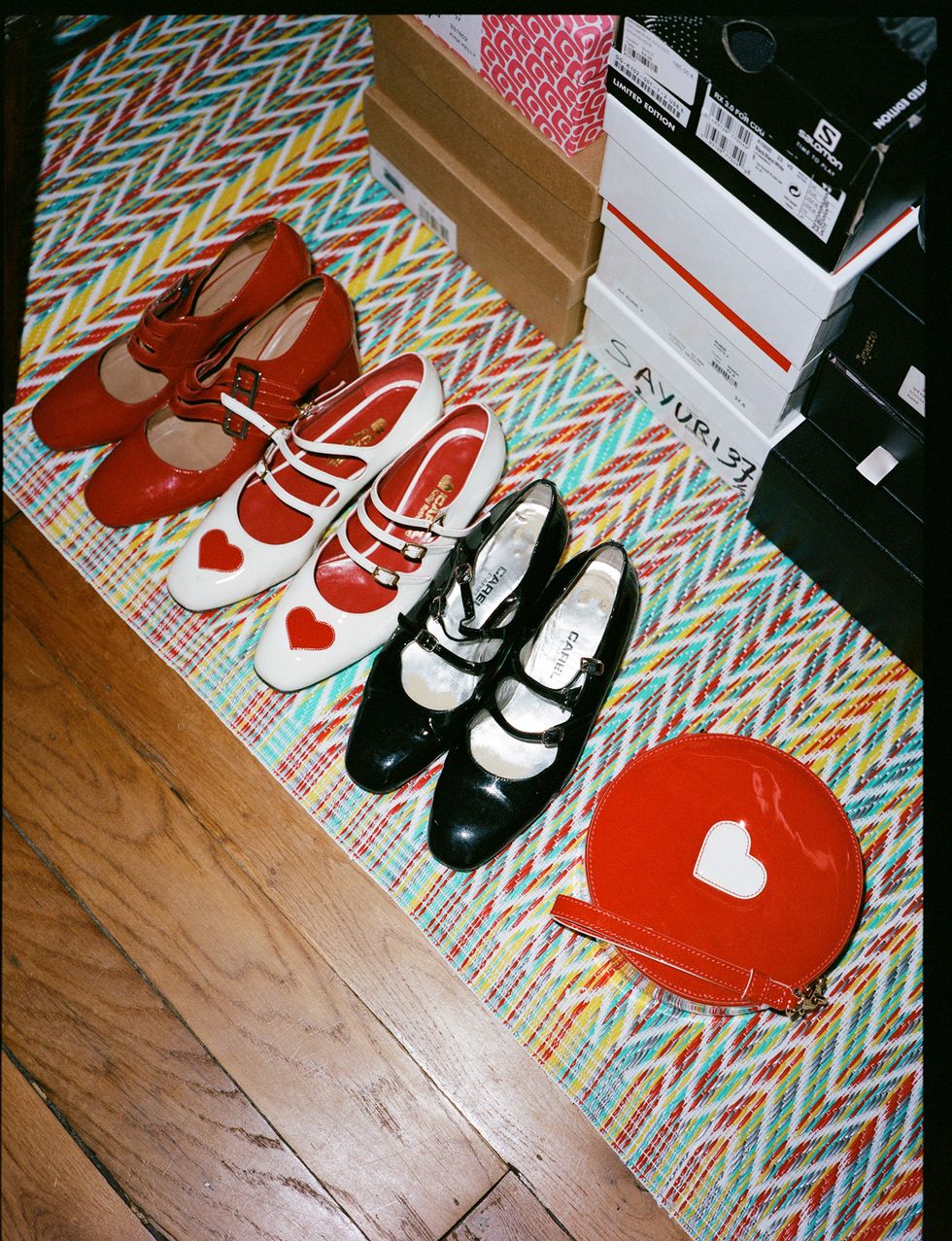 a group of shoes on a rug