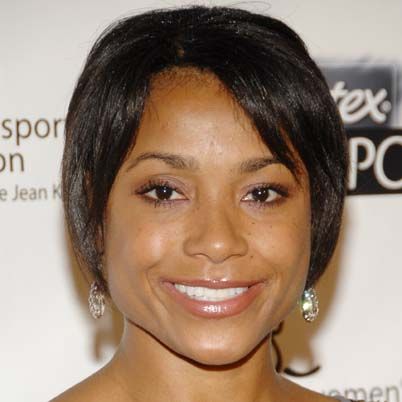 Honoree Dominique Dawes arrives at the Women's Sports Foundation's 28th Annual Salute to Women in Sports at the Waldorf-Astoria Hotel, Monday, Oct. 15, 2007 in New York. (AP Photo/Evan Agostini)
