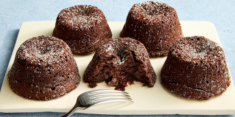 copycat dominos chocolate lava cakes topped with powdered sugar