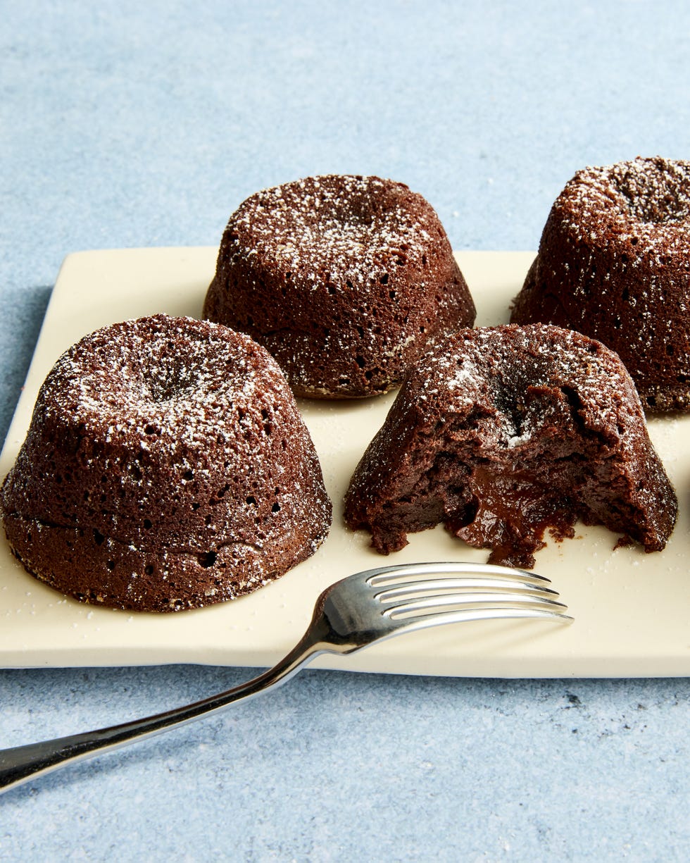 copycat dominos chocolate lava cakes topped with powdered sugar
