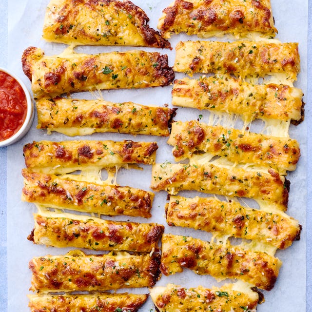 Copycat Domino’s Stuffed Cheesy Bread stuffed cheesy bread cut into breadsticks