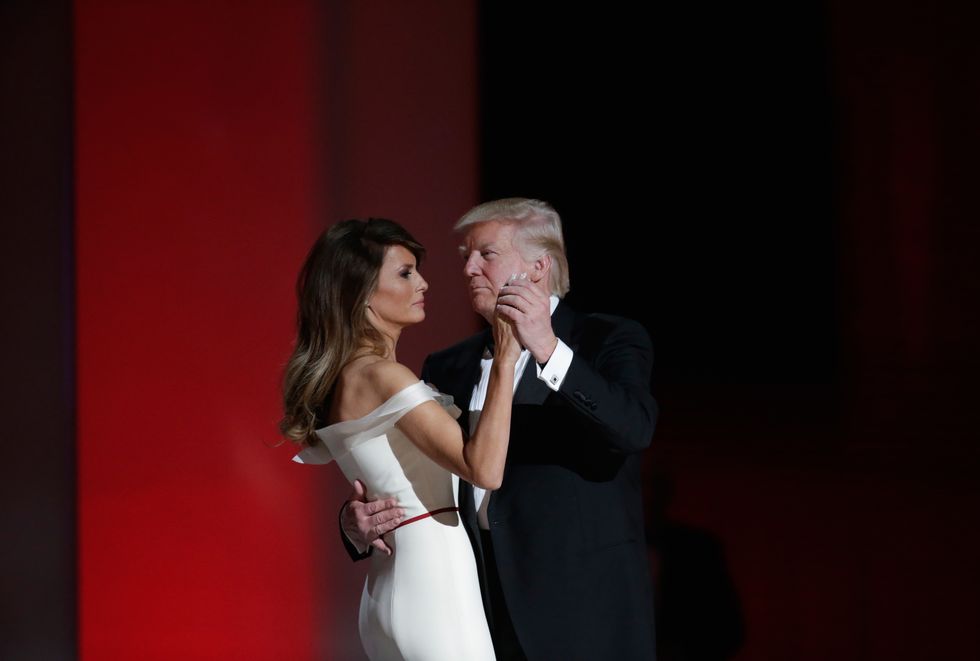 Donald Trump dances with wife Melania Trump at the Liberty Inaugural Ball on January 20, 2017 in Washington, DC