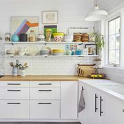 white kitchen, wooden countertops