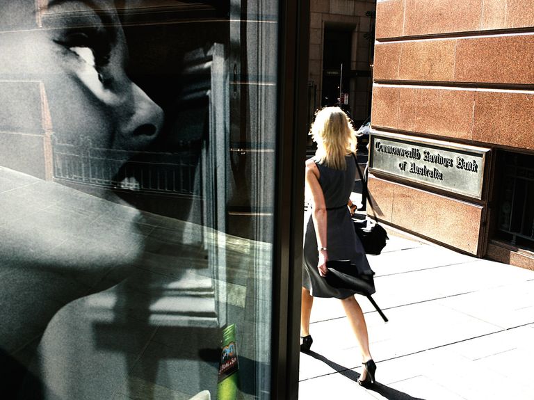 A woman walks past the Commonwealth Bank in Martin Place, Sydney, 28 November 20
