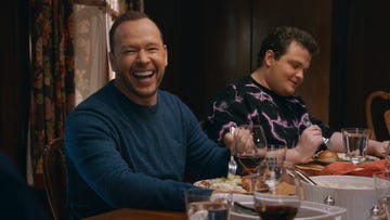 donnie wahlberg laughing at a sunday dinner on blue bloods