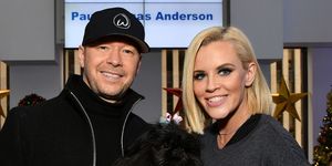 new york, ny   december 13  exclusive coverage donnie wahlberg and jenny mccarthy pose with their dog dj at siriusxm studios on december 13, 2017 in new york city  photo by slaven vlasicgetty images