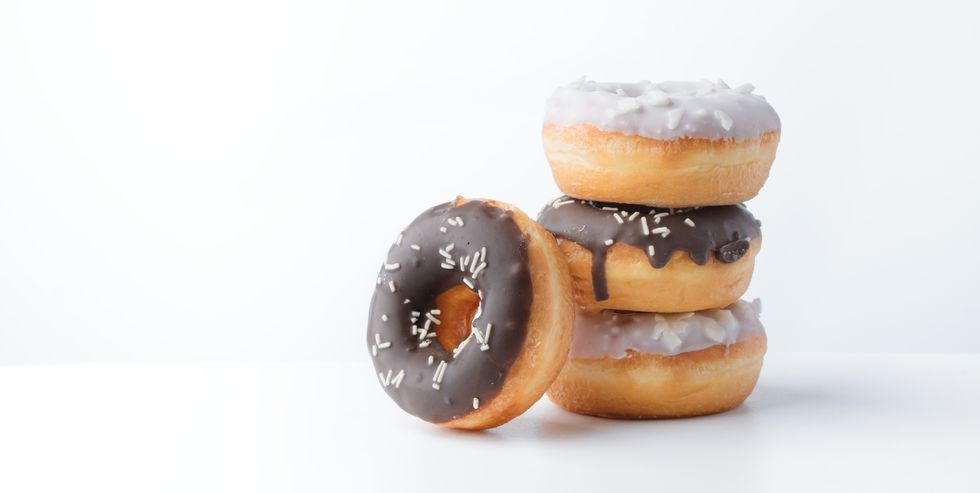 donuts with white and dark chocolate on a white background