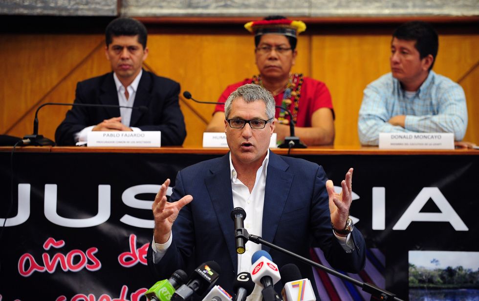 the lawyer of ecuadorean people affected by texaco chevron   who have long sought compensation for pollution between the 1970s and early 1990s   steven donziger, speaks during a press conference on march 19, 2014 in quito earlier this month, a us judge upheld chevrons allegations that an ecuadoran court decision ordering it to pay 95 billion for oil pollution in the amazon jungle was fraudulently obtained donziger announced they will appeal against this decision afp photo  rodrigo buendia        photo credit should read rodrigo buendiaafp via getty images