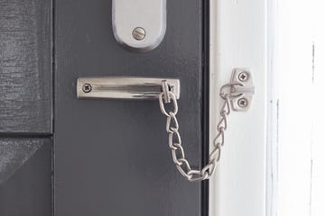 door chain on a grey door