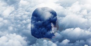 double exposure of woman looking off into sky and clouds