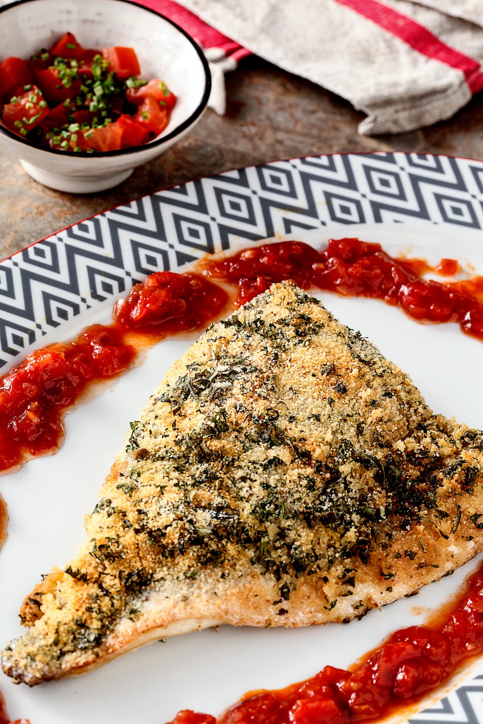 dorada gratinada con compota de tomate