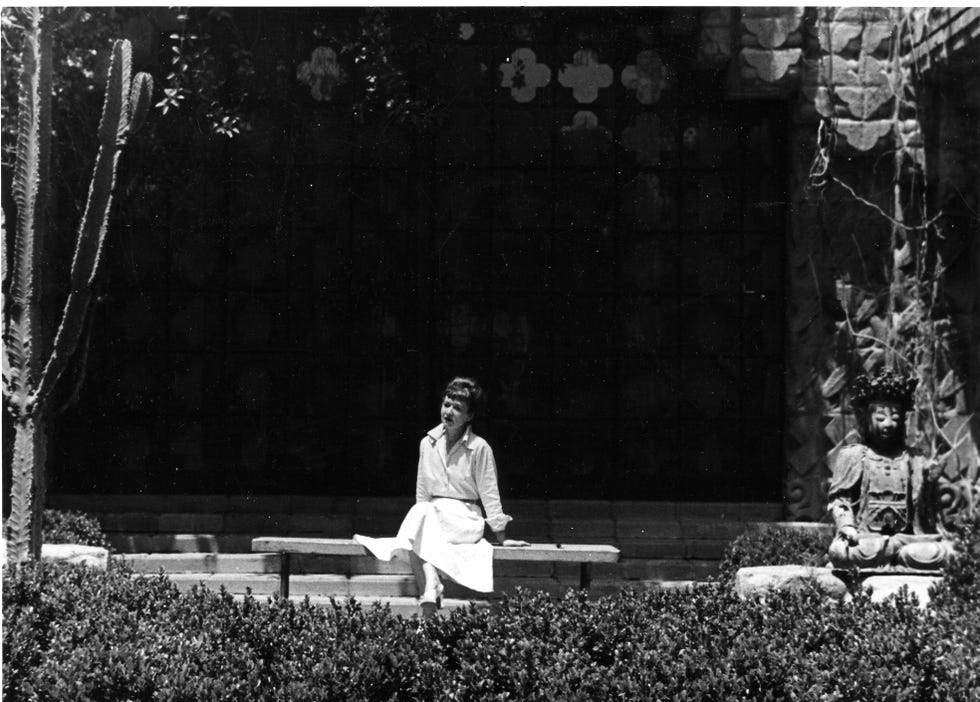 a person sitting on a bench a person sitting on a bench
