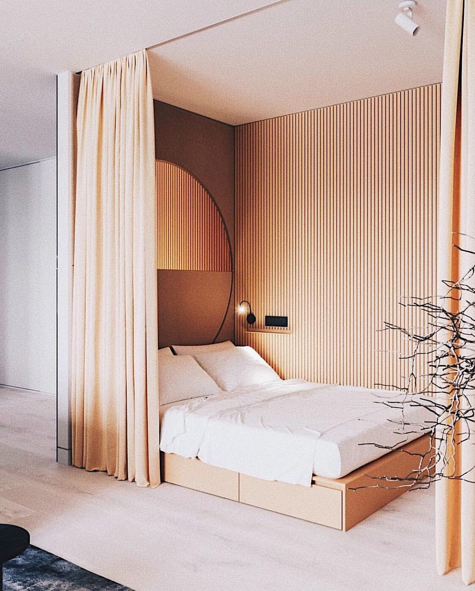 Dormitorio separado por cortinas
