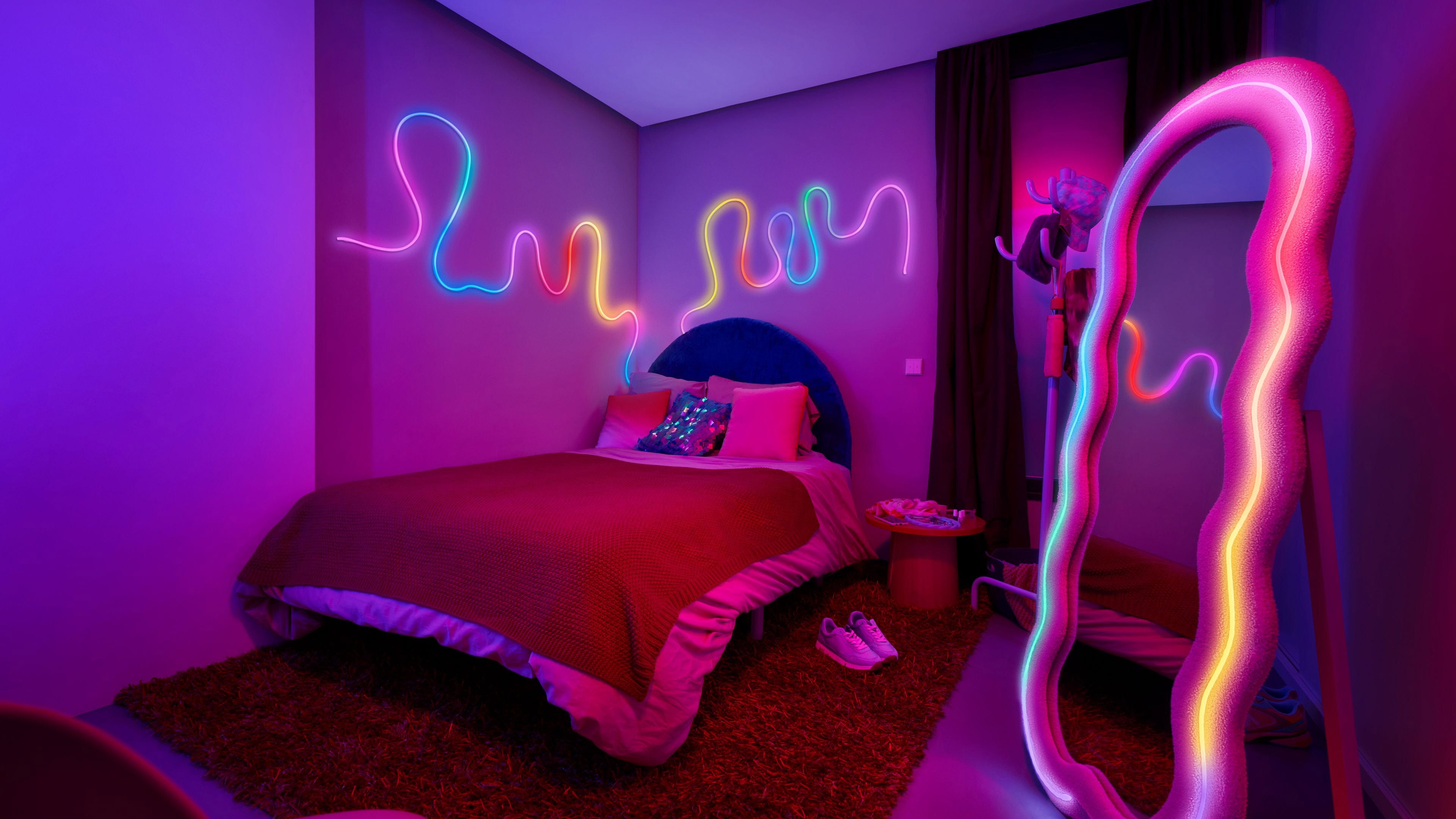 dormitorio juvenil femenino con tiras de luces led de colores