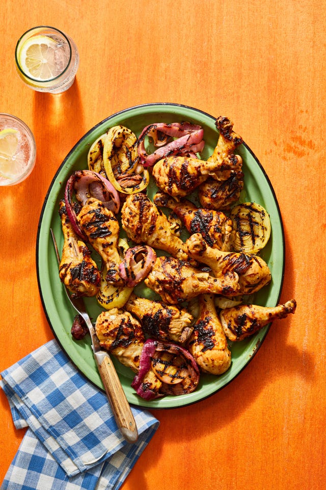 double mustard marinated chicken drumsticks on a green plate
