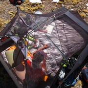 couple in double sleeping bag inside tent couple in double sleeping bag inside tent