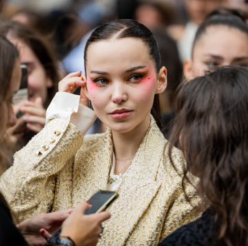 paris, france   october 02 dove cameron wears beige jacket outside valentino paris fashion week   womenswear springsummer 2023  day seven on october 02, 2022 in paris, france photo by christian vieriggetty images