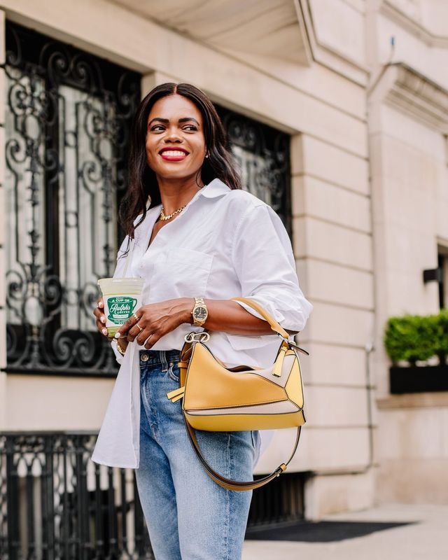 rose from dadouchic wears the ayr deep end shirt with jeans and a loewe bag in manhattan