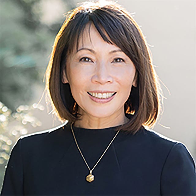 a woman smiling for the camera