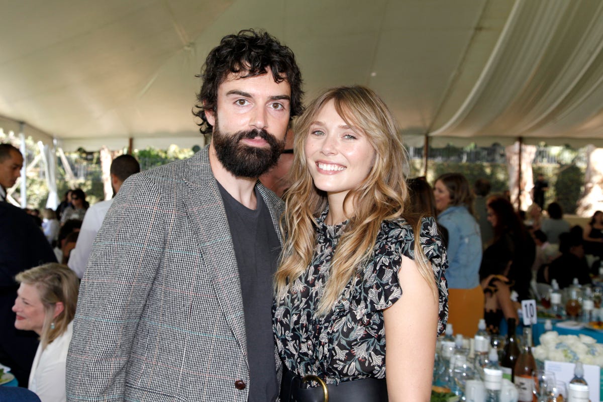 'doctor strange' 'wandavision' scarlet witch elizabeth olsen husband robbie arnett