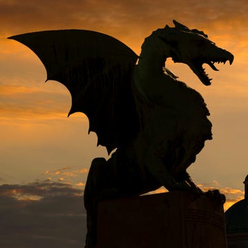 dragon statue on dragon bridge over ljublja