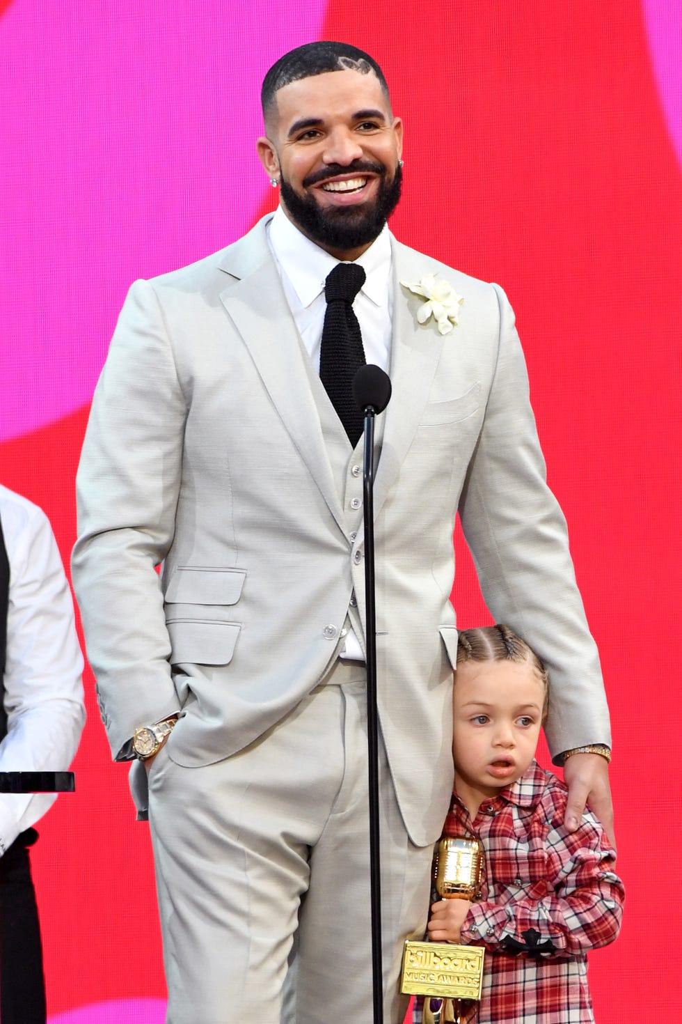 los angeles, california may 23 l r drake, winner of the artist of the decade award, and adonis graham speak onstage for the 2021 billboard music awards, broadcast on may 23, 2021 at microsoft theater in los angeles, california photo by kevin mazurgetty images