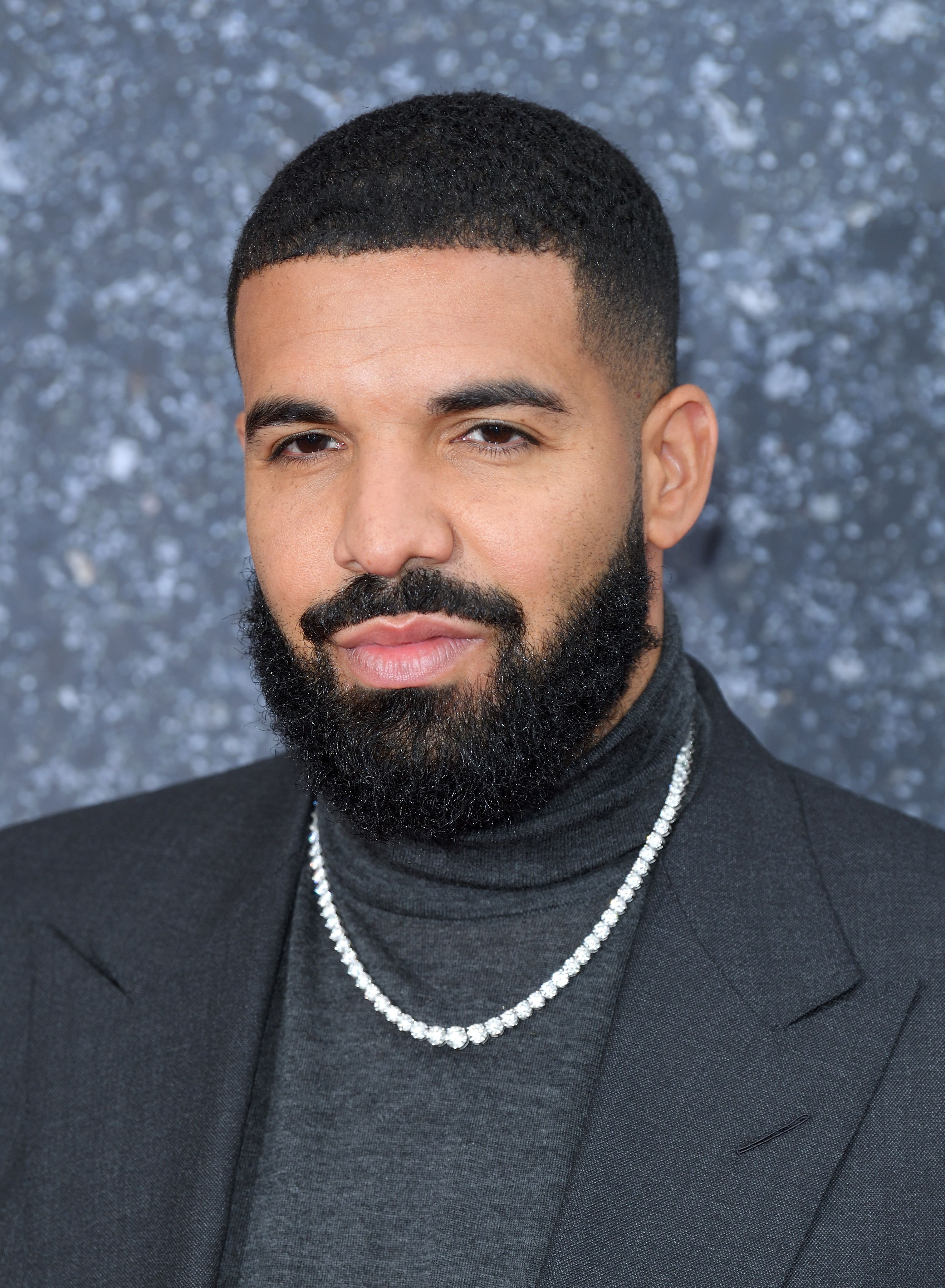 Drake blames COVID for his wonky haircut