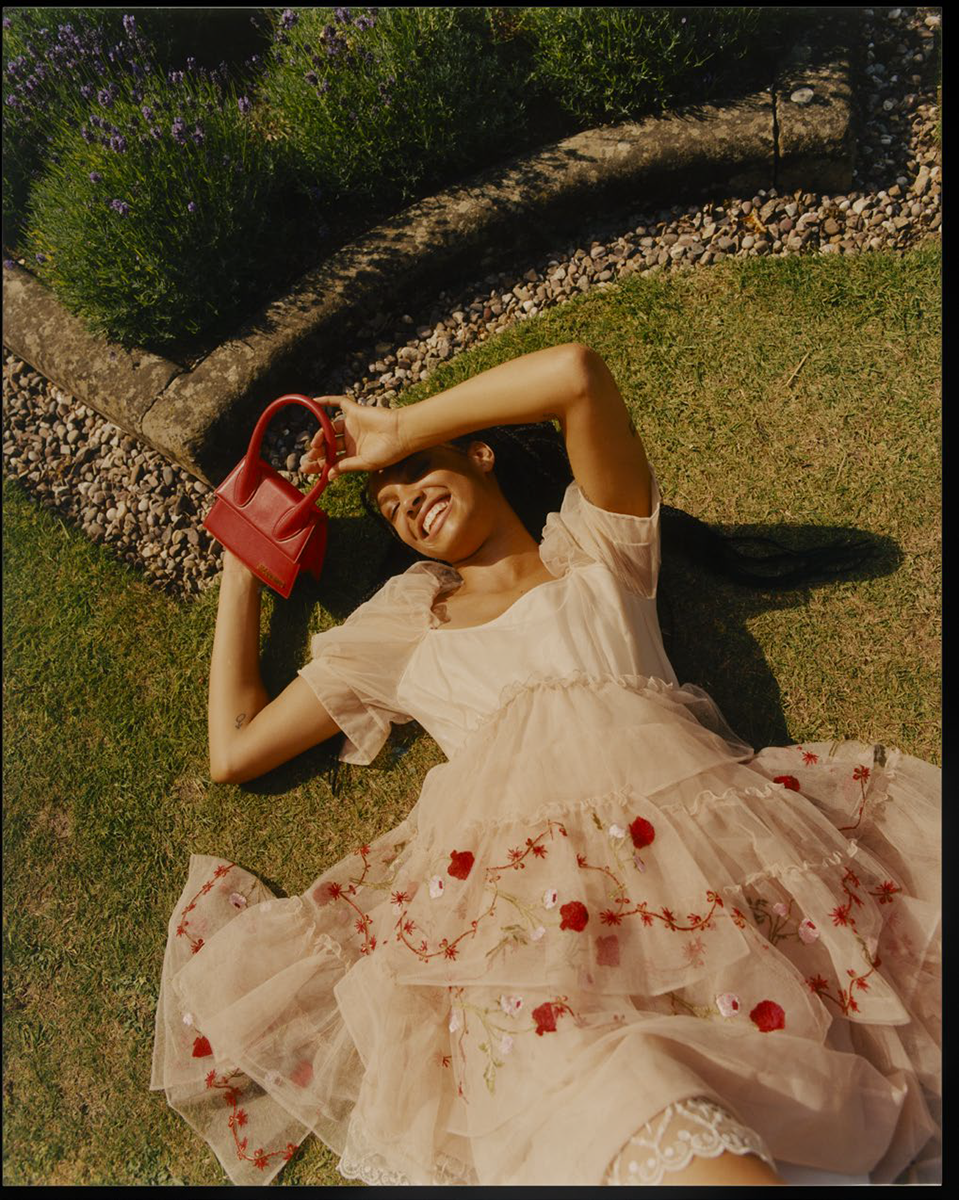 white tulle dress with red floral embroidery by simone rocha, available to rent at my wardrobe hq, red top handle leather bag by jacquemus, available to rent at bagbutler