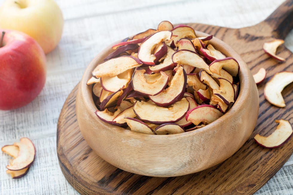 apple fruit crisps in a wooden bowl