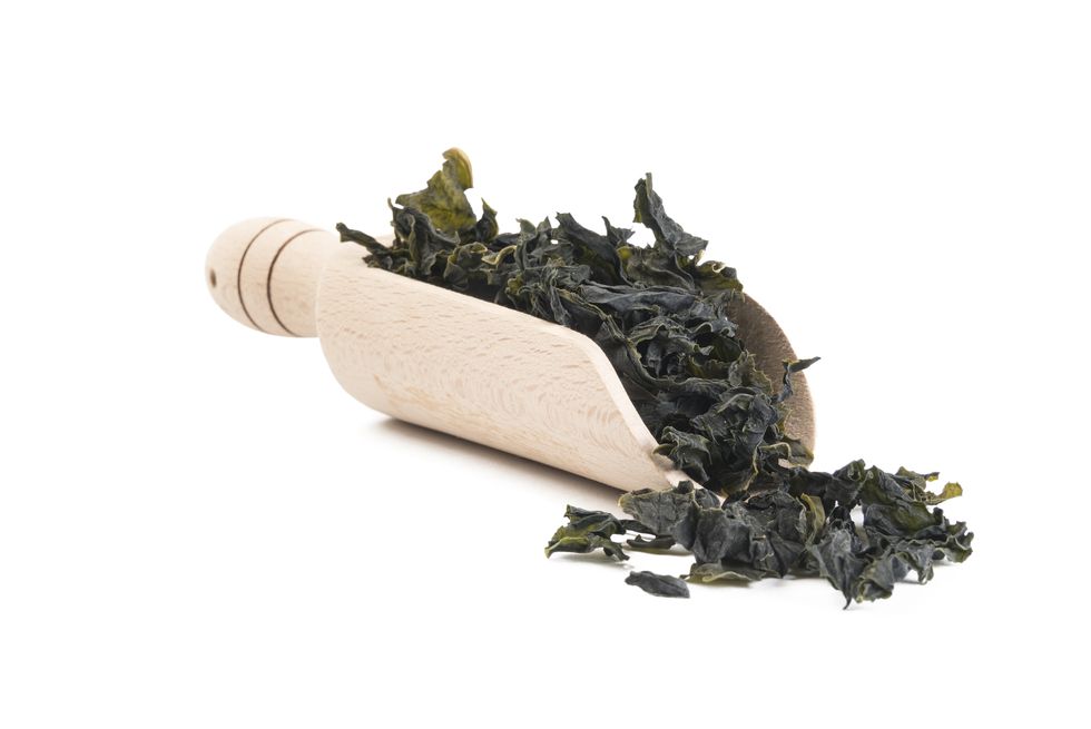 https://hips.hearstapps.com/hmg-prod/images/dried-kombu-seaweed-in-wooden-scoop-isolated-on-royalty-free-image-1575573172.jpg?crop=1xw:1xh;center,top&resize=980:*