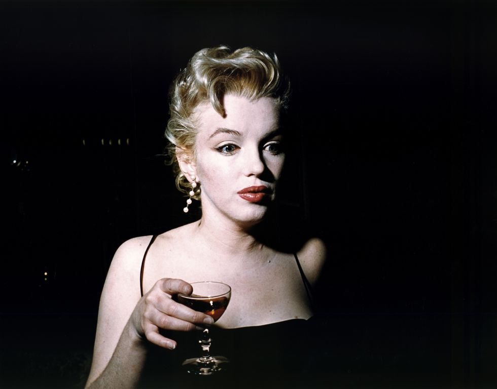Marilyn Monroe Carrying a Drink