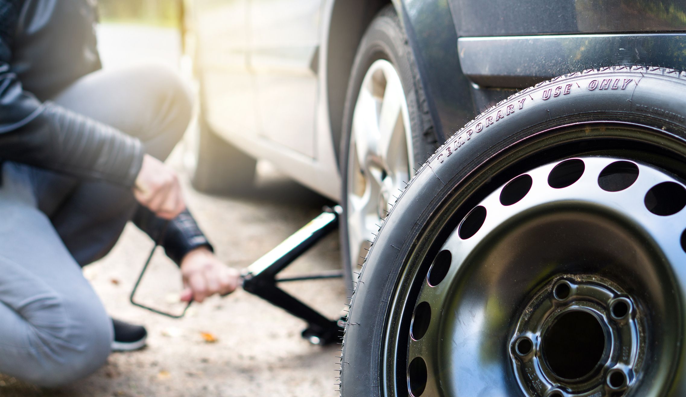 Changing a flat deals tire