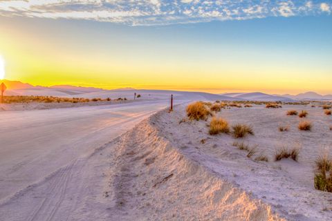 driving through the white sands national park of new mexico