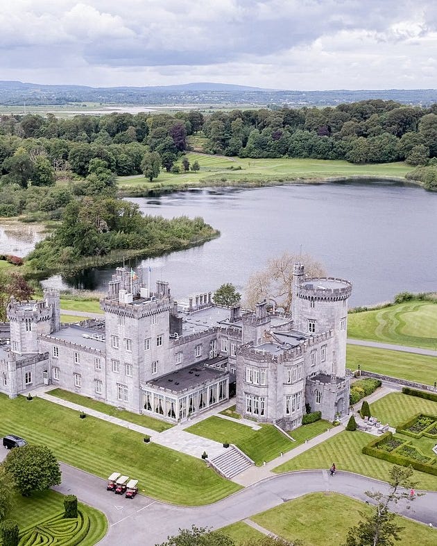castle historic castle surrounded by lush landscapes and a lake