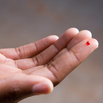 drop of blood on finger