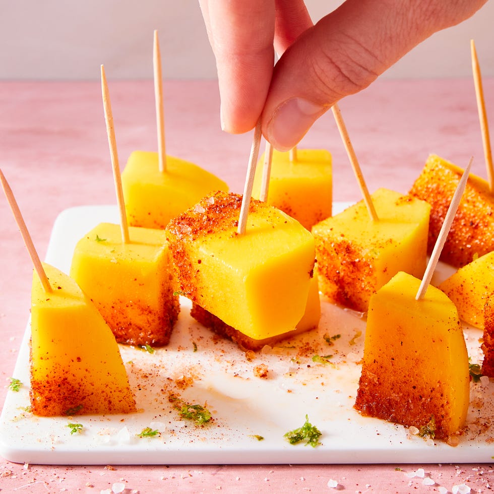 mango pieces cut into and soaked in tequila and topped with chili powder