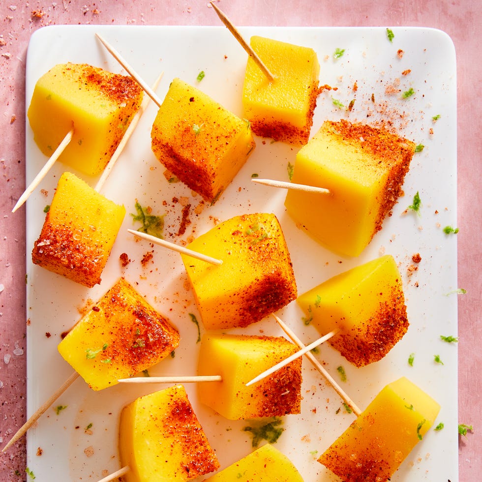 mango pieces cut into and soaked in tequila and topped with chili powder