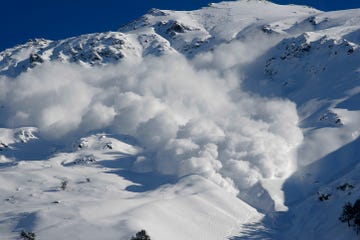 dry snow avalanche with a powder cloudcaucasus