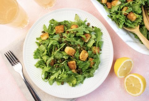 mustard greens salad with seared halloumi cheese and fried capers