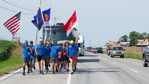 Flag, Recreation, Vehicle, Flag of the united states, Marathon, Running, Event, Road, Competition event, Veterans day, 