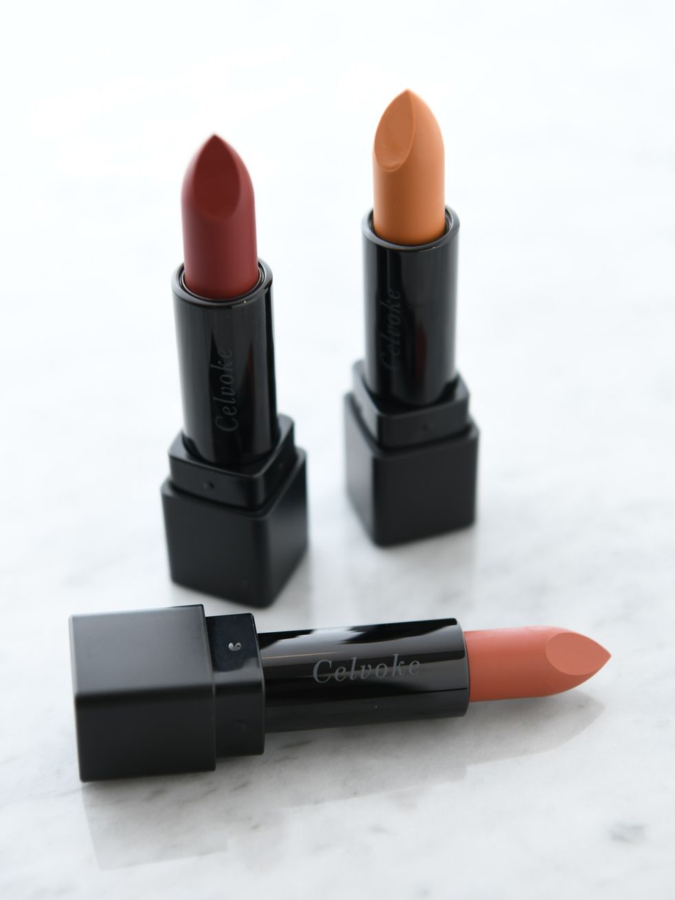 Lipstick, Red, Cosmetics, Orange, Product, Pink, Lip, Brown, Lip care, Material property, 